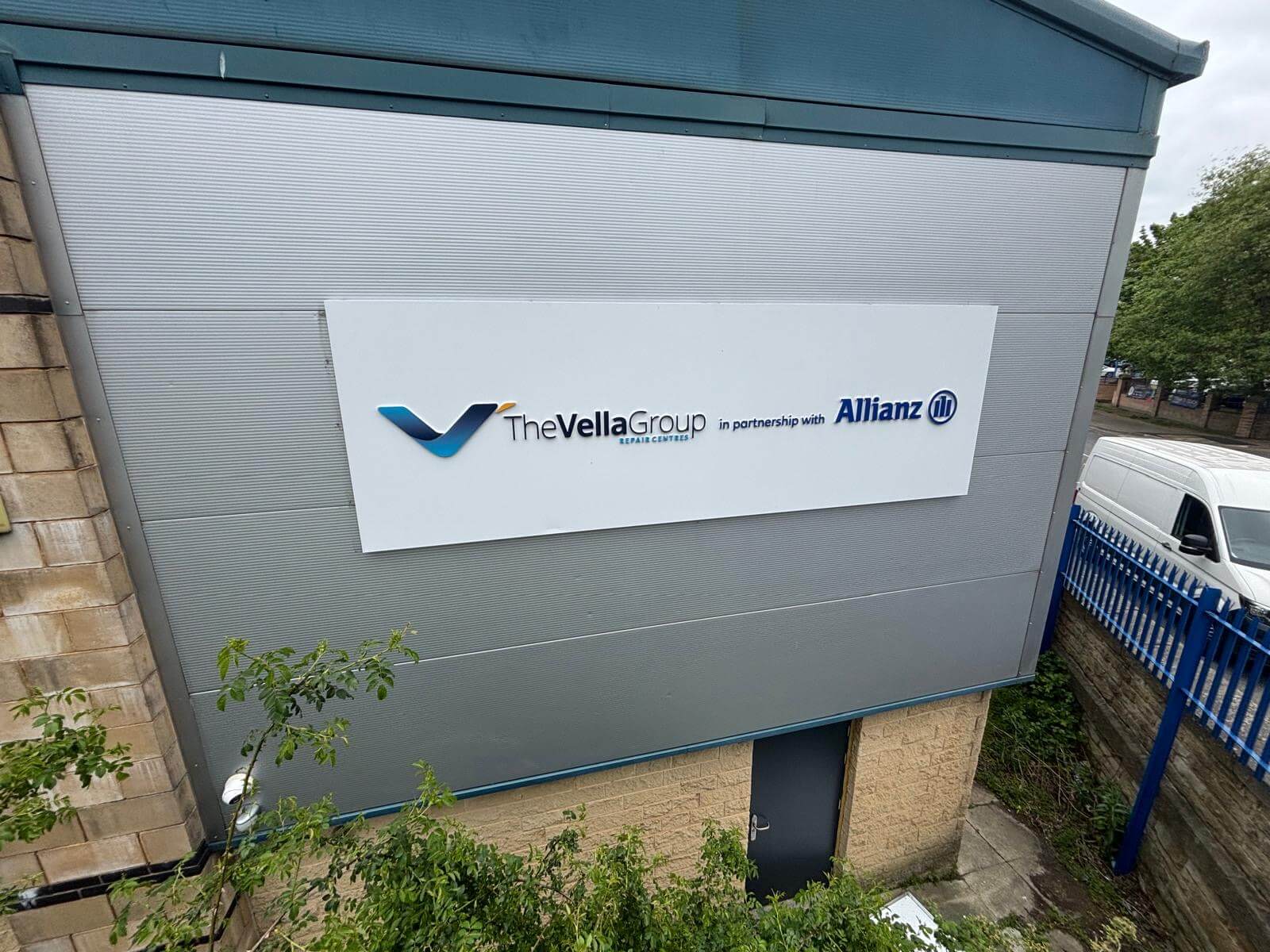 the vella group signage