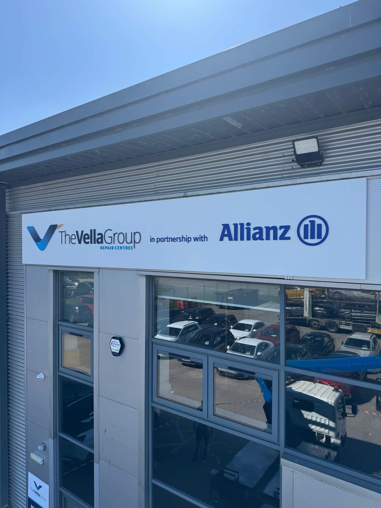 the vella group signage