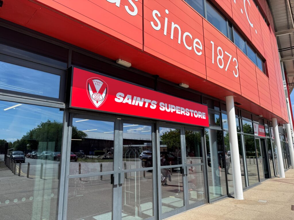 Illuminated 4.6m tray sign designed and installed by Vinyline for Saints RLFC Super Store