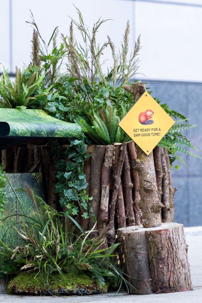 Outdoor advertising graphics takeover at Exchange Square tram stop Manchester