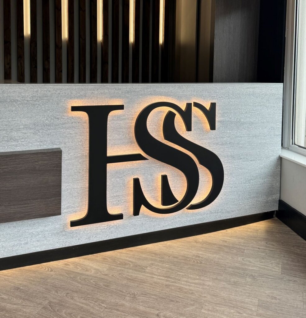 dentist reception illuminated acrylic signage by vinyline