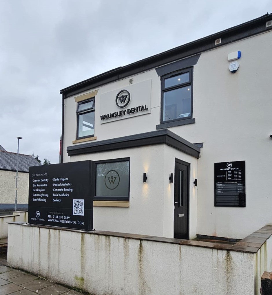 dentist building business signage in Manchester by vinyline