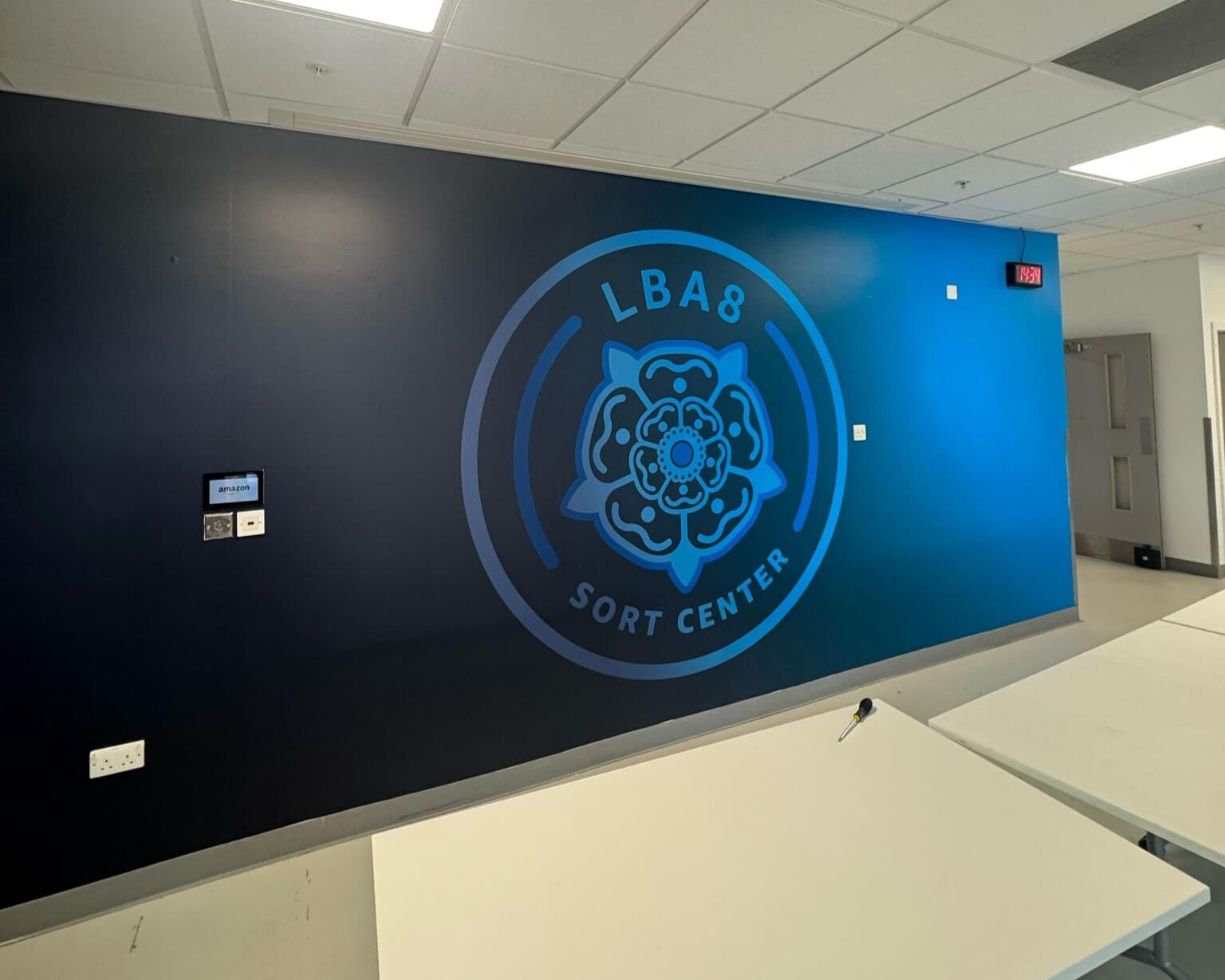 Custom environmental branding graphics for Amazon staff facilities