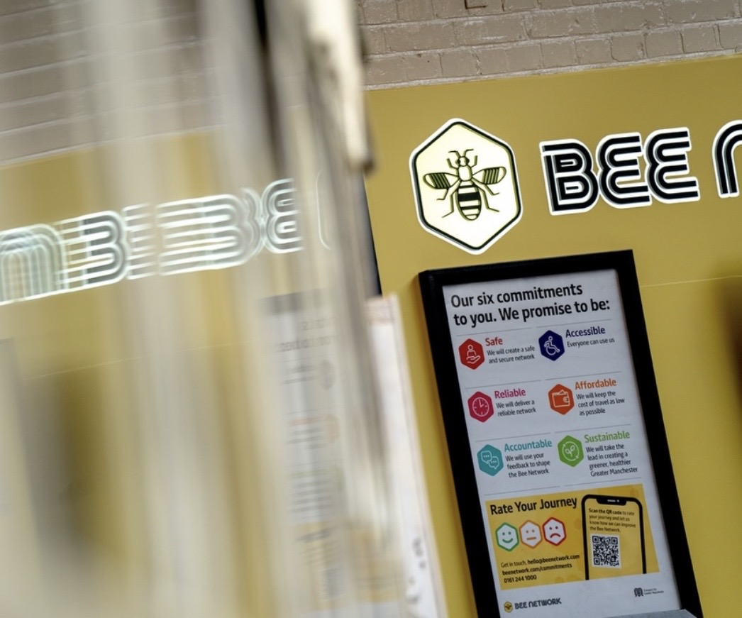 Illuminated acrylic lightbox within the Bee Network exhibition.