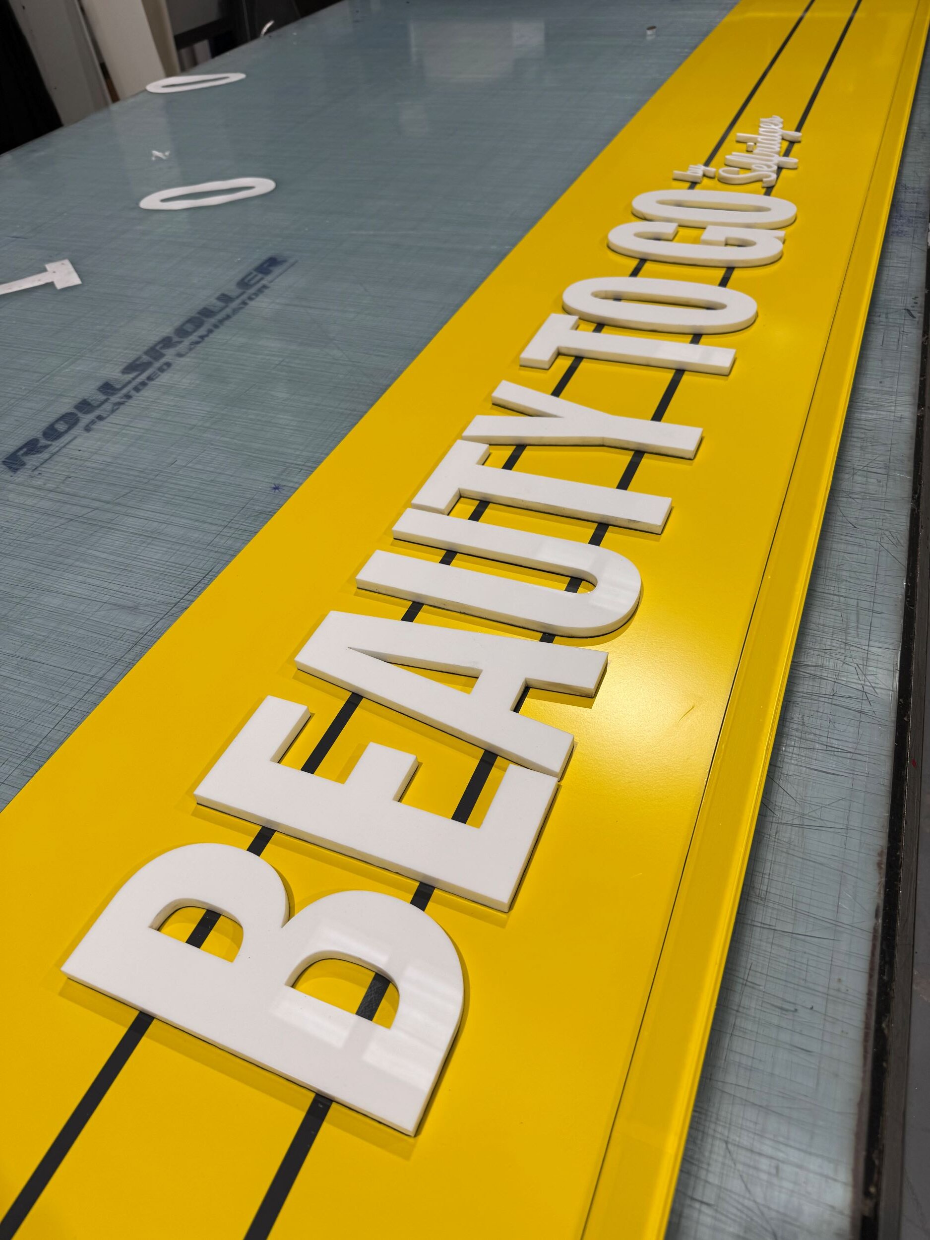 10mm perspex letters mounted to 3mm yellow dibond